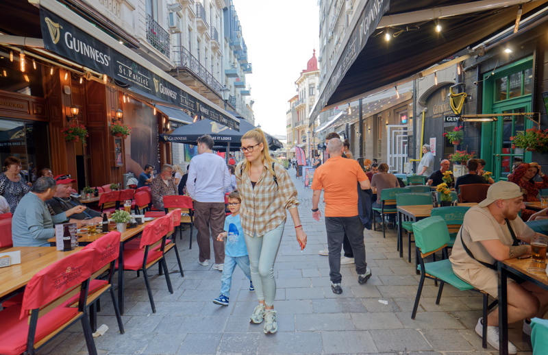 A cobblestone street with terraces of the Old Town in Bucharest